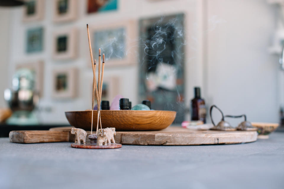 Incense sticks placed atop a table