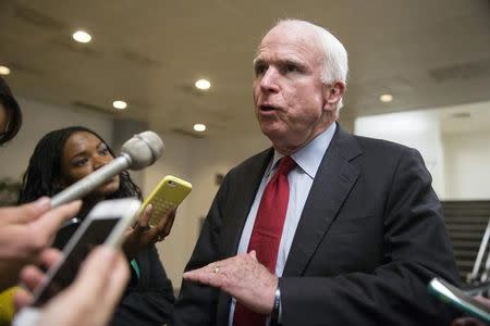 Senator John McCain (R-AZ) speaks to reporters after a procedural vote on Capitol Hill in Washington September 10, 2014. REUTERS/Joshua Roberts