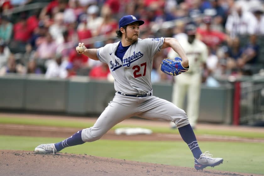 Los Angeles Dodgers starting pitcher Trevor Bauer (27) throws to an Atlanta Braves batter.