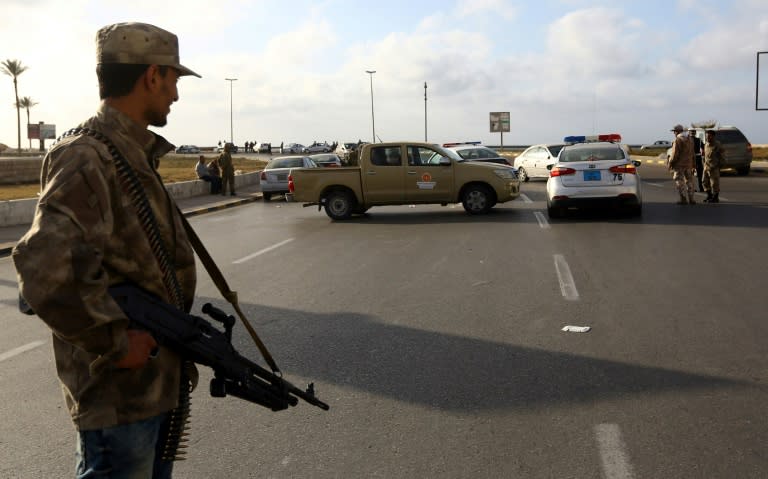 Forces loyal to Libya's Government of National Accord man a checkpoint in the Hay al-Andalus neighbourhood of Tripoli in March 2017