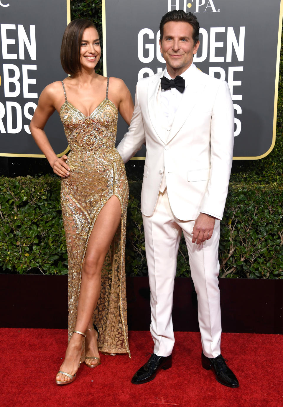 <p>The “A Star is Born” actor and director walked the red carpet with his longtime girlfriend (and <a rel="nofollow noopener" href="https://www.elitedaily.com/p/is-bradley-cooper-married-heres-what-to-know-about-his-relationship-with-irina-shayk-15552162" target="_blank" data-ylk="slk:rumoured;elm:context_link;itc:0;sec:content-canvas" class="link ">rumoured</a> fiancée), model Irina Shayk. Image via Getty Images. </p>