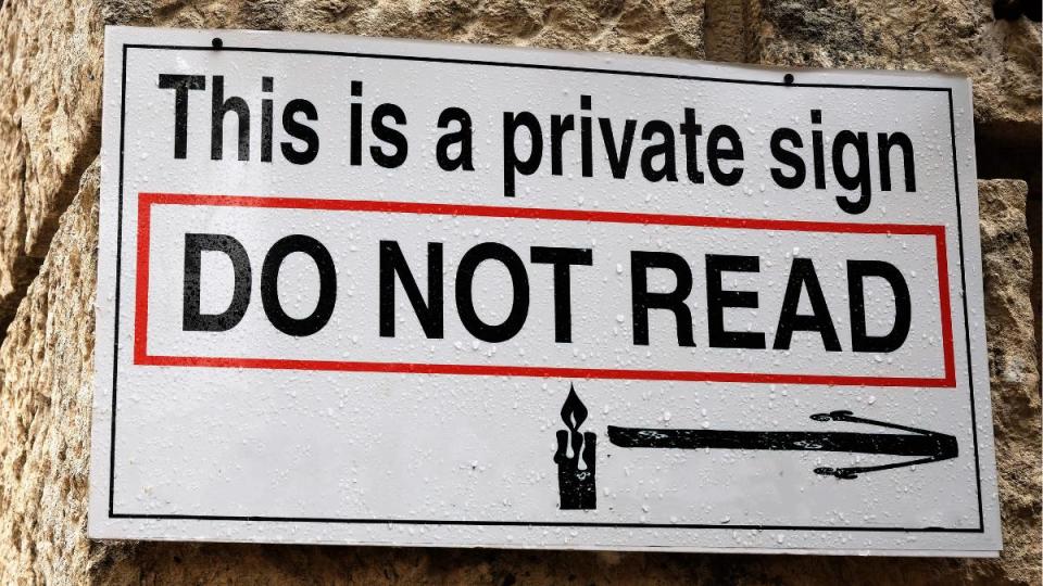 A funny street sign on a wall in Kotor, Montenegro saying 