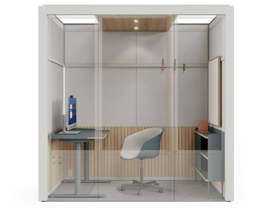 a rendering of a Room for Zoom booth with a white frame and a chair, desk, whiteboard, desktop