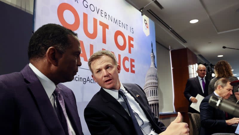 Reps. Blake Moore and Burgess Owens, R-Utah, speak during a regulatory reform event held at Zions Bank in downtown Salt Lake City on Thursday, May 30, 2024.