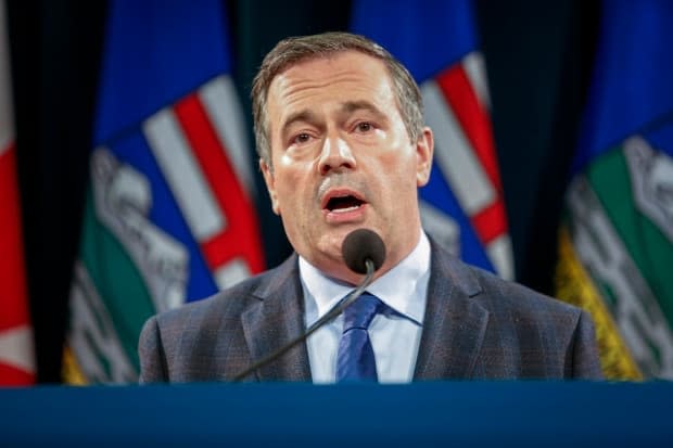 Alberta Premier Jason Kenney announced a state of public health emergency and sweeping new COVID-19 measures for the province on Wednesday, as he apologized for his government's handling of the pandemic. (JeffMcIntosh/The Canadian Press - image credit)