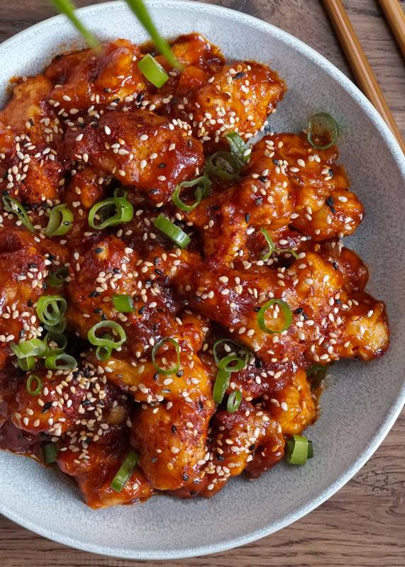 <p>Khin's Kitchen</p><p>Korean spicy chicken recipe with crispy deep-fried chicken in spicy, sweet and savory Korean sauce.</p><p><strong>Get the recipe: <a href="https://khinskitchen.com/korean-spicy-chicken/" rel="nofollow noopener" target="_blank" data-ylk="slk:Korean Spicy Chicken;elm:context_link;itc:0;sec:content-canvas" class="link ">Korean Spicy Chicken</a></strong></p>