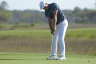 Apr 13, 2018; Hilton Head, SC, USA; Bryson DeChambeau putts on the green of the 18th hole during the second round of the RBC Heritage golf tournament at Harbour Town Golf Links. Mandatory Credit: Joshua S. Kelly-USA TODAY Sports