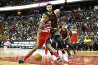 Nov 18, 2018; Washington, DC, USA; Washington Wizards guard Bradley Beal (3) dribbles the ball as Portland Trail Blazers center Jusuf Nurkic (27) defends during the second quarter at Capital One Arena. Mandatory Credit: Amber Searls-USA TODAY Sports