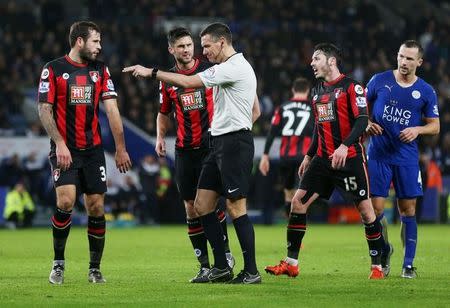 Football Soccer - Leicester City v AFC Bournemouth - Barclays Premier League - King Power Stadium - 2/1/16 Bournemouth players surround referee Andre Marriner Action Images via Reuters / Alex Morton Livepic