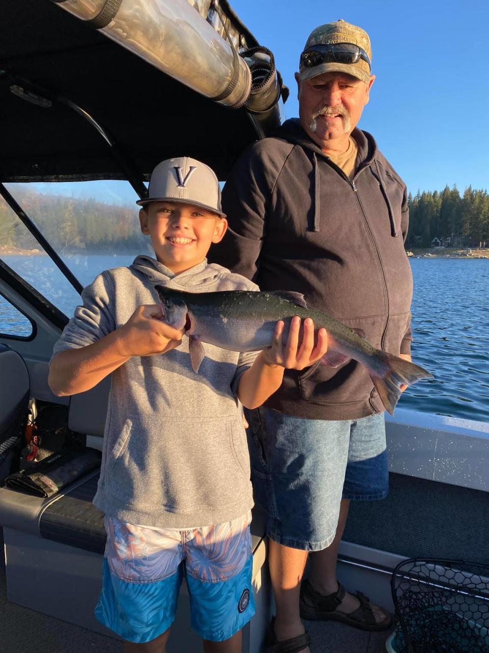 Ten year-old Reed Schiebelhut, fishing with his grandpa on Shaver Lake on Aug 6, landed his first kokanee which measured 20 inches.