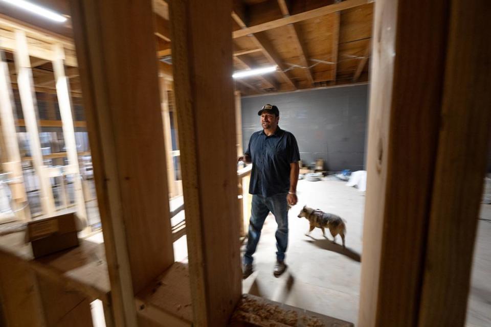 Owner Chris Teicheira is in the process of building a comedy club on Main Street in Manteca, it is named for his deaf dog Banshee. Photographed at Deaf Puppy Club in Manteca, Calif., Wednesday, Sept. 20, 2023.