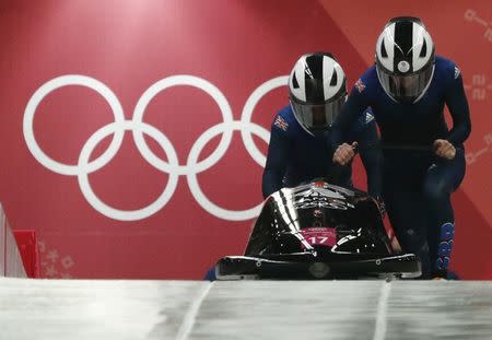 Bobsleigh - Pyeongchang 2018 Winter Olympics - Women's Competition - Olympic Sliding Centre - Pyeongchang, South Korea - February 20, 2018 - Mica Mcneill and Mica Moore of Britain in action. REUTERS/Edgar Su