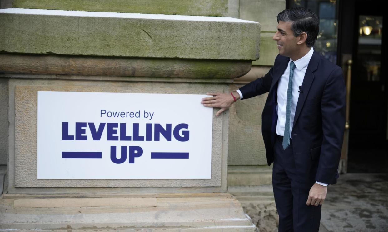 <span>Rishi Sunak during a community project visit Lancashire in 2023. ‘Astonishing delays’ have been identified in the delivery of levelling up projects.</span><span>Photograph: Christopher Furlong/PA</span>