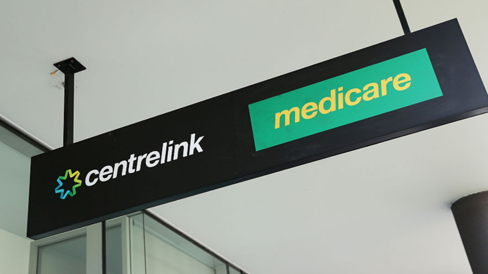 Centrelink and medicare sign out front of building. 