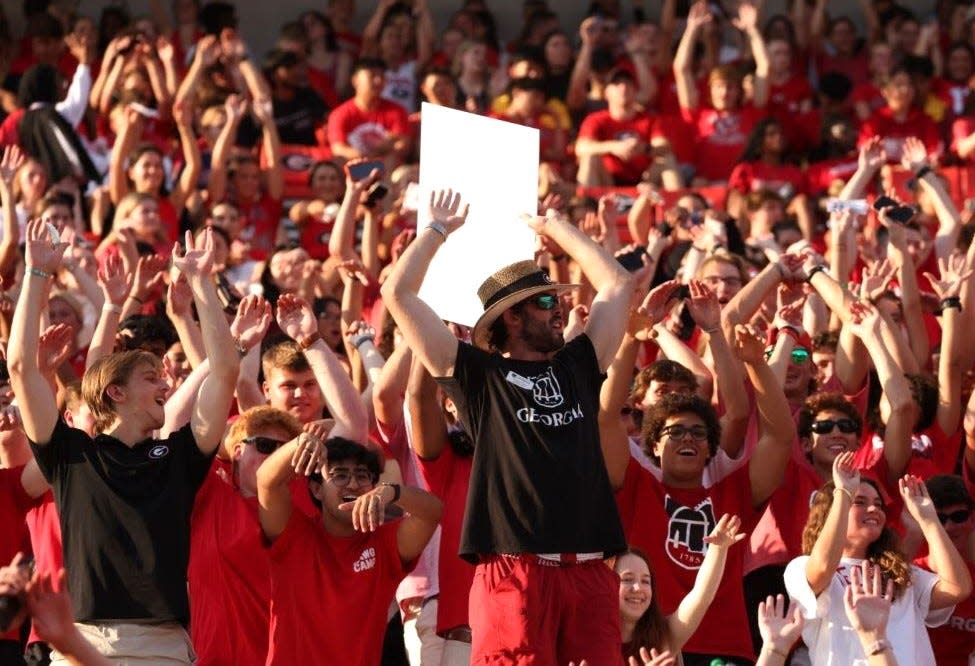 UGA students celebrate at the UGA Freshman Welcome event held Tuesday in Sanford Stadium.