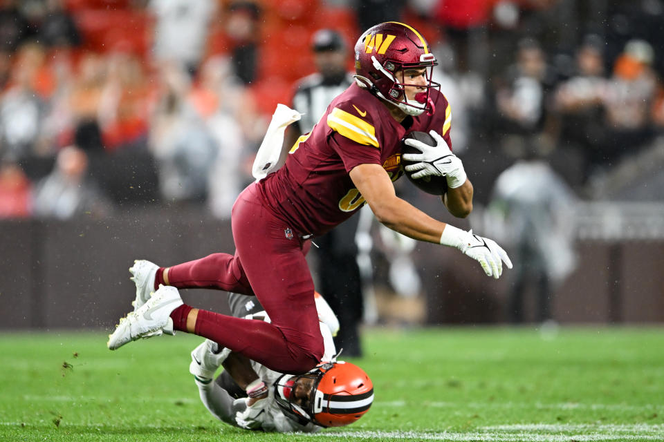 Cole Turner #85 of the Washington Commanders is tackled by <a class="link " href="https://sports.yahoo.com/nfl/players/26356" data-i13n="sec:content-canvas;subsec:anchor_text;elm:context_link" data-ylk="slk:Rodney McLeod;sec:content-canvas;subsec:anchor_text;elm:context_link;itc:0">Rodney McLeod</a> #26. (Photo by Nick Cammett/Getty Images)