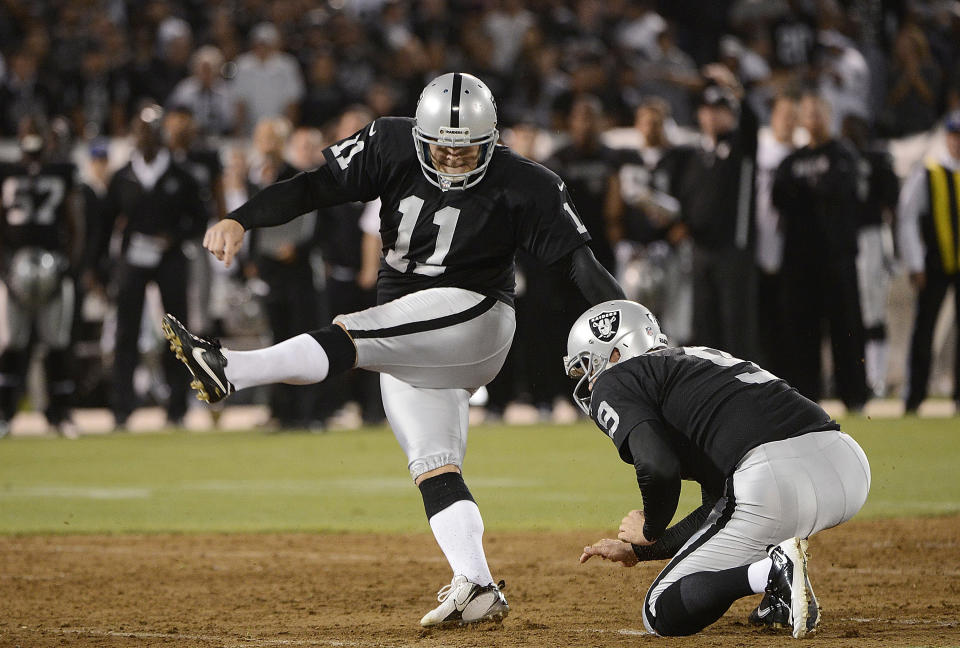 Sebastian Janikowski #11 of the Oakland Raiders kicks a fifty one yard field goal in the first quarter of the season opener against the San Diego Chargers at Oakland-Alameda County Coliseum on September 10, 2012 in Oakland, California. (Photo by Thearon W. Henderson/Getty Images)