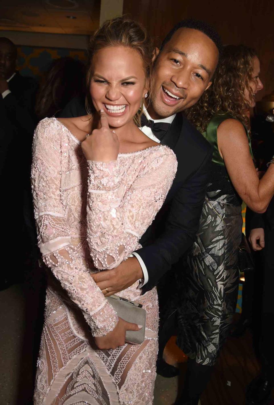 Model Chrissy Teigen (L) and recording artist John Legend attend HBO's Official Golden Globe Awards After Party at The Beverly Hilton Hotel on January 11, 2015 in Beverly Hills, California