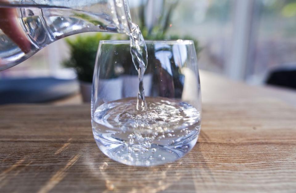 <p>Water is your life source, but it can also fill you up. Sometimes you might think you're hungry, but you're actually just thirsty. Drink a steady amount of water throughout the day to keep yourself full so you don't snack on unhealthy things. </p>