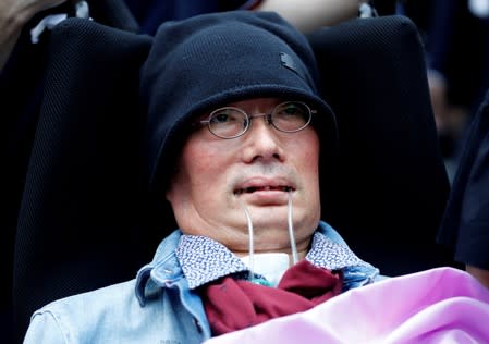 Reiwa Shinsengumi's disabled candidate for Japan's July 21 upper house election Yasuhiko Funago, who has ALS, attends an election rally in Tokyo