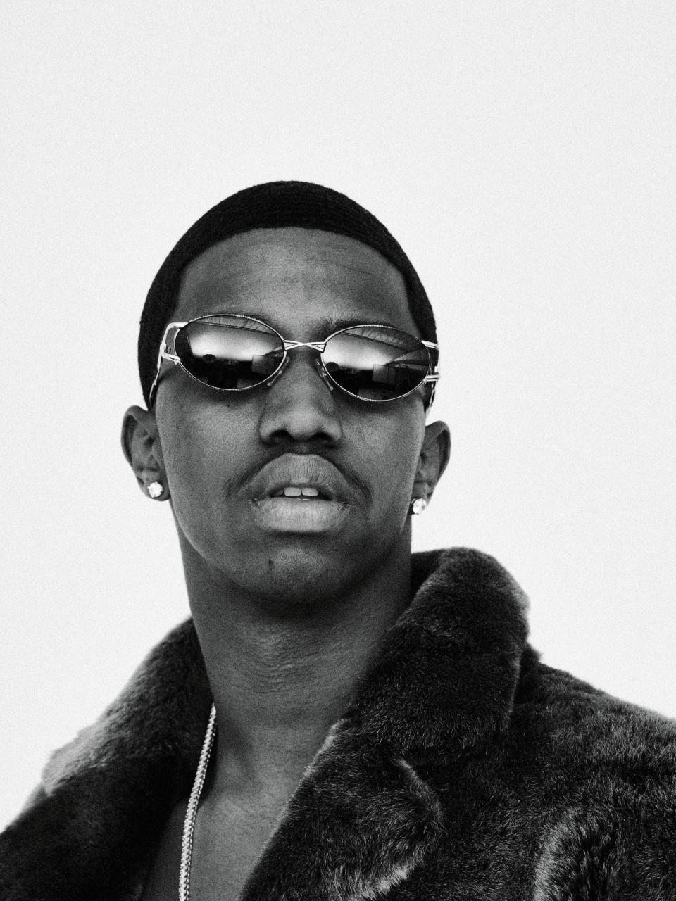 This year marks the 20th anniversary of the launch of Sean John. So we spoke to Tommy Hilfiger, André Leon Talley, Fonzworth Bentley, Naomi Campbell and more—including <a rel="nofollow noopener" href="https://www.gq.com/story/diddy-gq-cover-story-2018?mbid=synd_yahoo_rss" target="_blank" data-ylk="slk:GQ cover star Diddy himself;elm:context_link;itc:0;sec:content-canvas" class="link ">GQ cover star Diddy himself</a>—about the brand's secrecy-shrouded beginnings, globe-trotting heights, and bar-raising legacy. And then we asked Christian Combs, Diddy's son (and damn-near doppelgänger), to show off some archival Sean John gear.