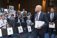 Boeing CEO Dave Calhoun followed by Boeing Chief Engineer and Executive Vice President of Engineering, Test & Technology Howard McKenzie arrive to testify before the Senate Homeland Security and Governmental Affairs Subcommittee on Investigations to answer to lawmakers about troubles at the aircraft manufacturer since a panel blew out of a Boeing 737 Max during an Alaska Airlines flight in January, at the Capitol in Washington, Tuesday, June 18, 2024. (AP Photo/Manuel Balce Ceneta)