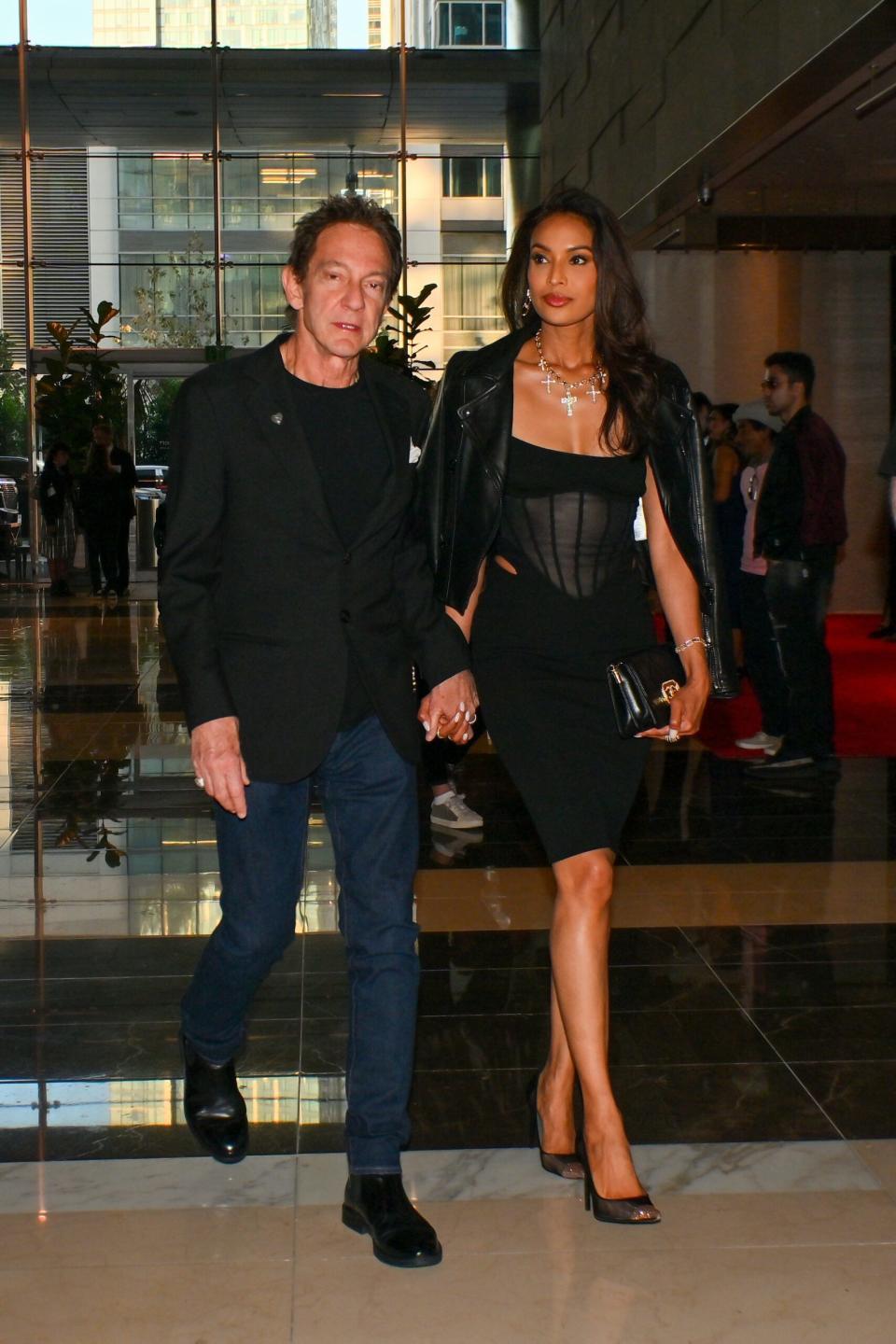 Michael Jackson lawyer John Branca and Jamaican supermodel Kamini Chinloy attending the Grammys. 05 Feb 2023 Pictured: John Branca, Kamini Chinloy.