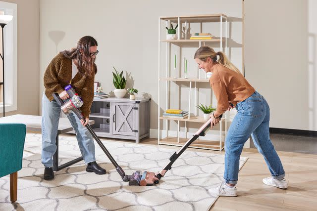 <p>People / Dera Burreson</p> The Dyson V8 and Shark Wandvac go head-to-head in the testing lab