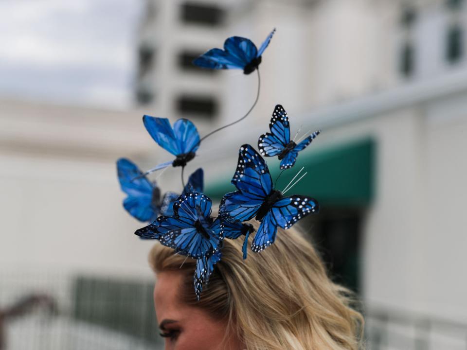 A butterfly headpiece at the 2023 Kentucky Derby.