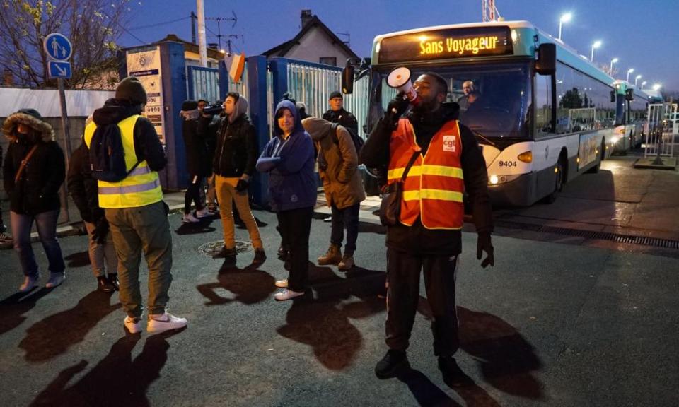 Union members and employees of the Paris transport network RATP block a bus depot in Les-Pavillons-sous-Bois near Paris