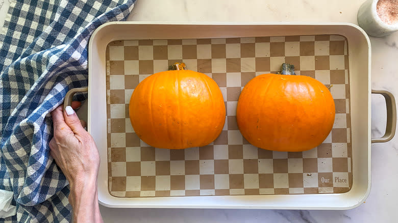 pumpkins on baking sheet