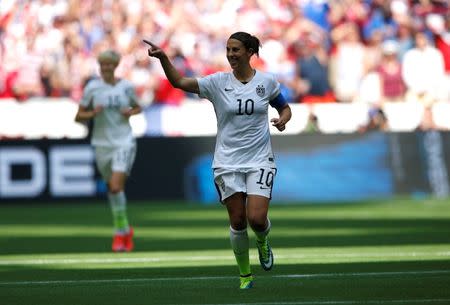 United States midfielder Carli Lloyd (10) celebrates after scoring against Japan during the first half of the final of the FIFA 2015 Women's World Cup at BC Place Stadium. Mandatory Credit: Michael Chow-USA TODAY Sports