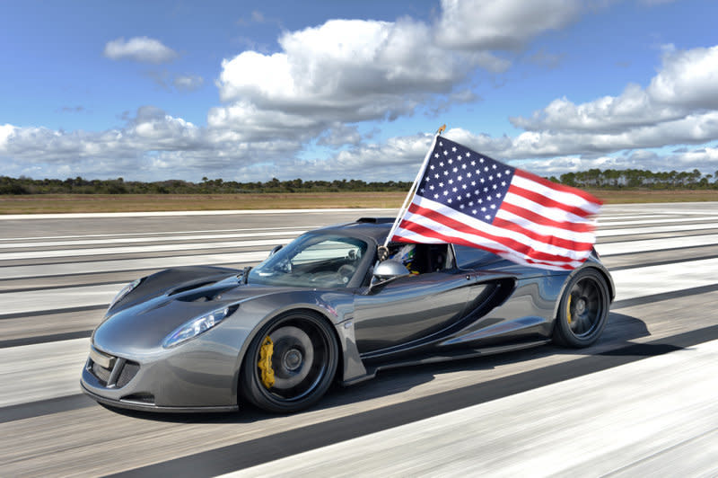 The Hennessey Venom GT shows its colors after the U.S.-made car tops the speed record for a production vehicle set by the Bugatti Veyron. The Venom reached speeds of 270.49 mph, just breaking the previous record of 269.86 mph. 