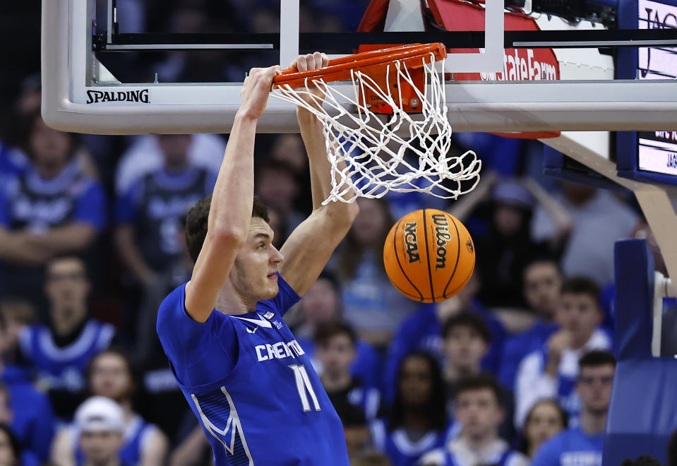 Creighton center Ryan Kalkbrenner (11) dunks against Seton Hall during the second half of an NCAA college basketball game in Newark, N.J. Saturday, Jan. 20, 2024. Creighton won 97-94 in triple overtime. (AP Photo/Noah K. Murray)