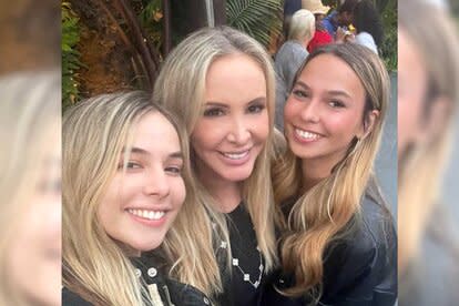 Shannon Beador posing for a photo with her twin daughters.