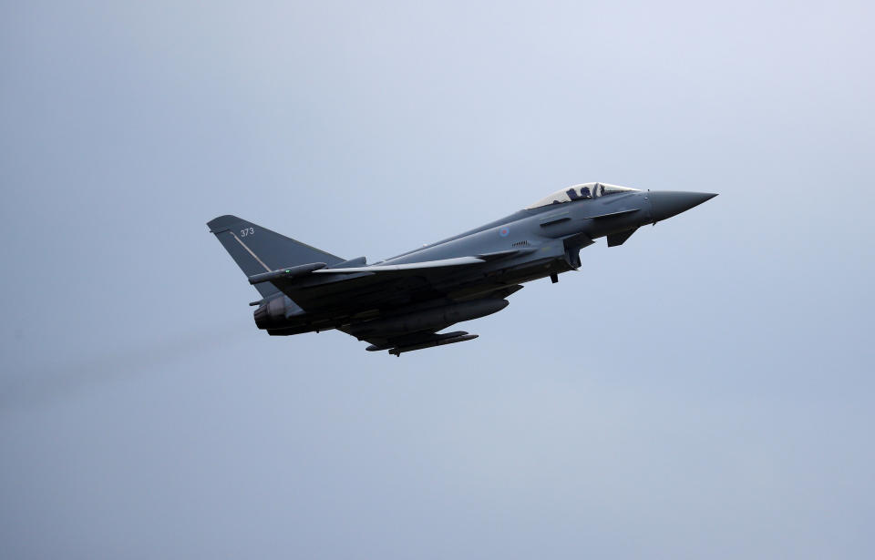 An RAF Typhoon jet takes off during a visit by the Duke of Cambridge to RAF Coningsby in Lincolnshire.