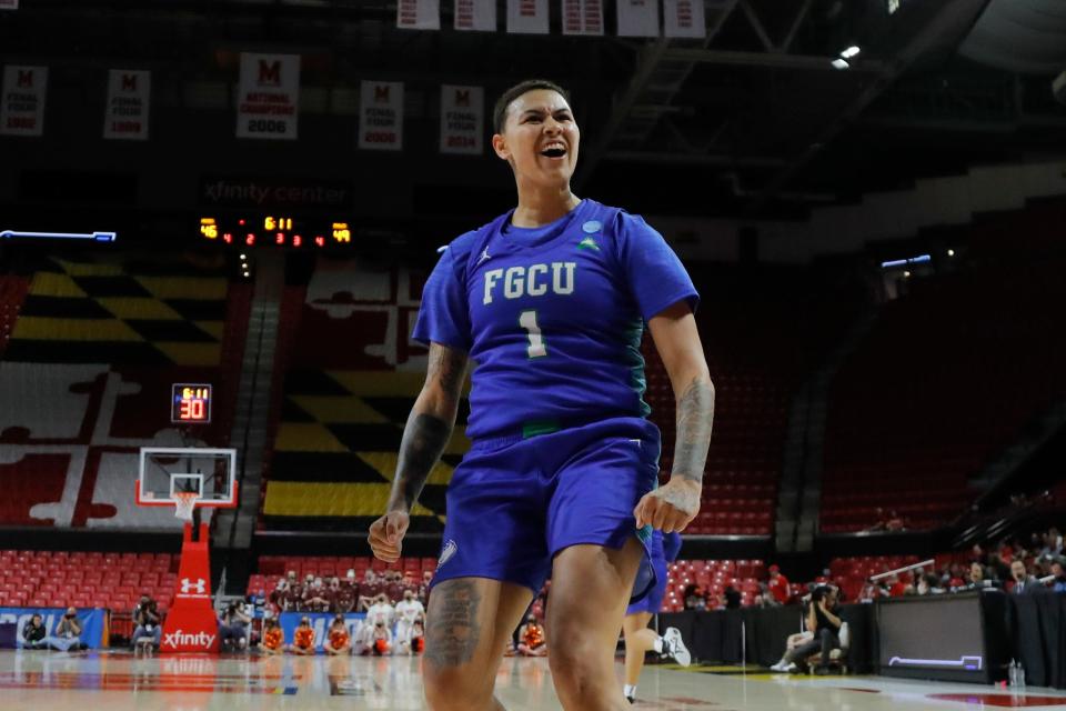 Florida Gulf Coast guard Kierstan Bell reacts after a play against Virginia Tech during the second half of an NCAA Tournament first-round game, Friday, March 18, 2022, in College Park, Md. Florida Gulf Coast won 84-81. (AP Photo/Julio Cortez)