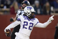 TCU wide receiver Blair Conwright (22) celebrates after catching a 47-yard touchdown pass in the first half an NCAA college football game against Iowa State, Friday, Nov. 26, 2021, in Ames, Iowa. (AP Photo/Charlie Neibergall)