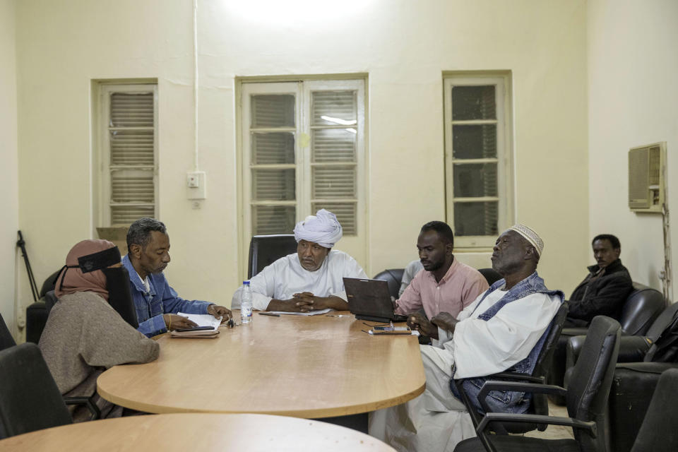 In this Jan. 11, 2020 photo, Sudanese families who lost loved ones during last years' revolution gather for a meeting, at the Revolutionary Martyrs Center, in Khartoum, Sudan. Sudan's young protesters who led the uprising against former President Omar al-Bashir say they've lost trust in the generals leading the country after a brutal crackdown on their sit-in last summer by security forces that killed dozens. The generals have shown little willingness to hand over power to a civilian-led administration, one the demonstrators' key demands. (AP Photo/Nariman El-Mofty)