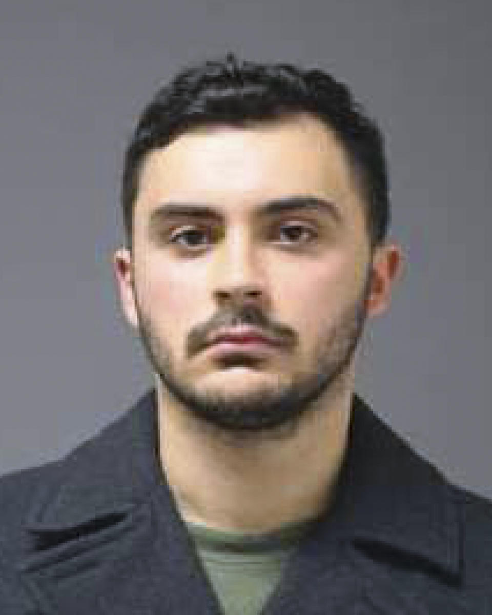 This image provided by University of Connecticut Police shows a Monday, Oct. 21, 2019 booking photo of Ryan Mucaj, of Granby, Conn. Mucaj and another UConn student have been charged with shouting a racial slur outside a campus apartment complex in an episode that was caught on video and has led to protests at the school. (University of Connecticut Police via AP)