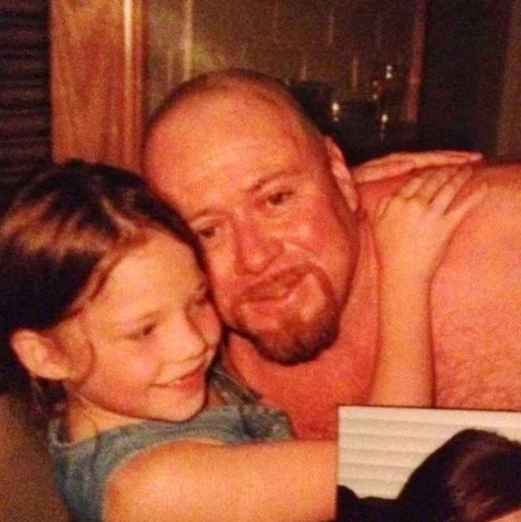 Her step dad Paul’s sudden death caused her mum’s health to deteriorate. Sam pictured with Paul, aged five. Source: TheLangaugeOfSam