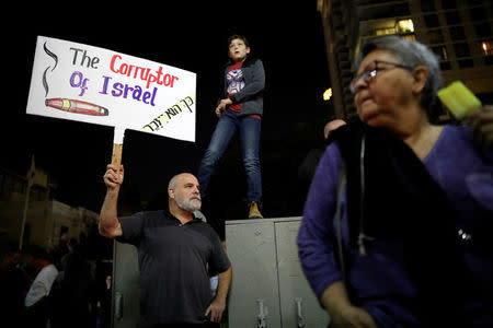 Israelis take part in a protest against corruption in Tel Aviv, Israel December 2, 2017. REUTERS/Amir Cohen