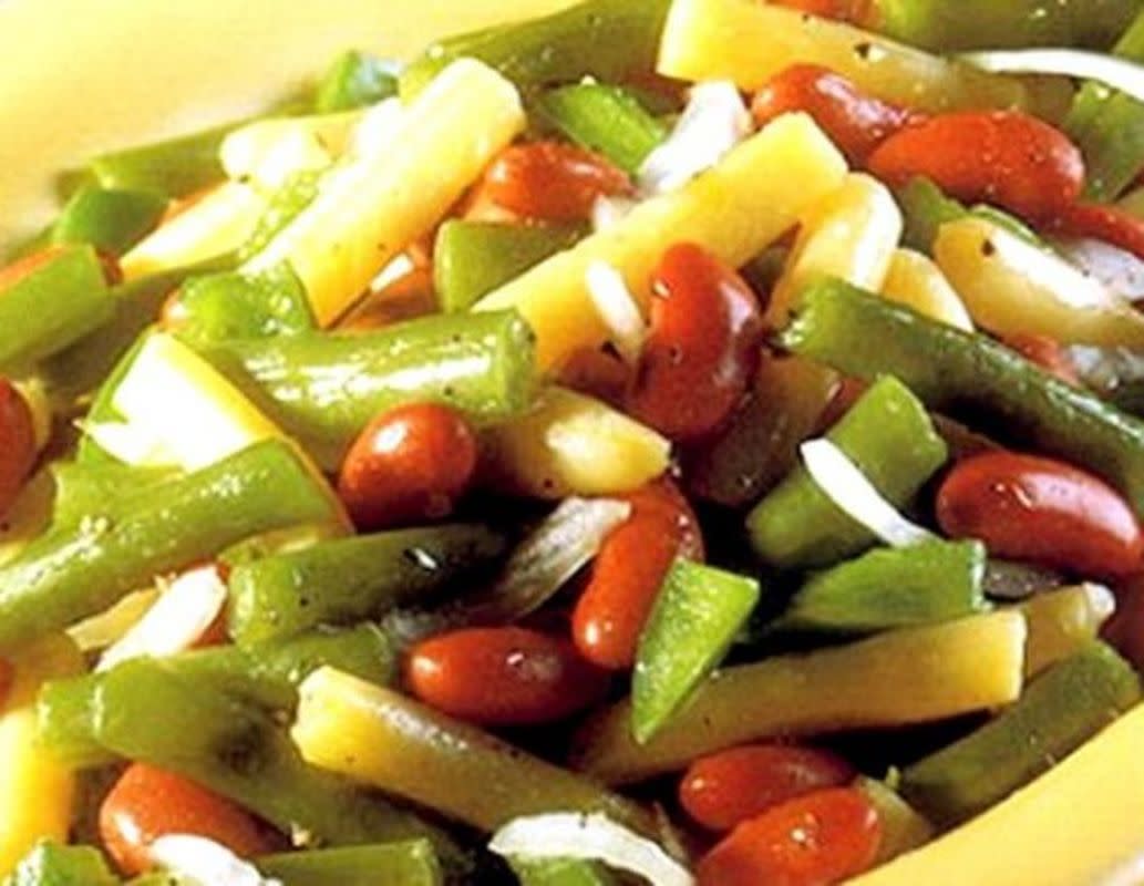 <p>Life’s a Tomato</p><p>This copycat of the bean salad you used to be able to get at KFC is just as good as Mom’s, if not better. </p><p><strong>Get the recipe: </strong><a href="https://www.lifesatomato.com/2020/10/07/copycat-kfc-bean-salad/" rel="nofollow noopener" target="_blank" data-ylk="slk:Copycat KFC Bean Salad;elm:context_link;itc:0;sec:content-canvas" class="link rapid-noclick-resp"><strong>Copycat KFC Bean Salad</strong></a></p>
