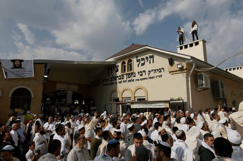 FILE PHOTO: Ultra-Orthodox Jewish pilgrims pray at the tomb of Rabbi Nachman of Breslov during the celebration of Rosh Hashanah holiday, the Jewish New Year, in the town of Uman