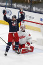 Columbus Blue Jackets' Nick Foligno, left, celebrates their goal against Detroit Red Wings' Jonathan Bernier during the second period of an NHL hockey game Tuesday, March 2, 2021, in Columbus, Ohio. (AP Photo/Jay LaPrete)