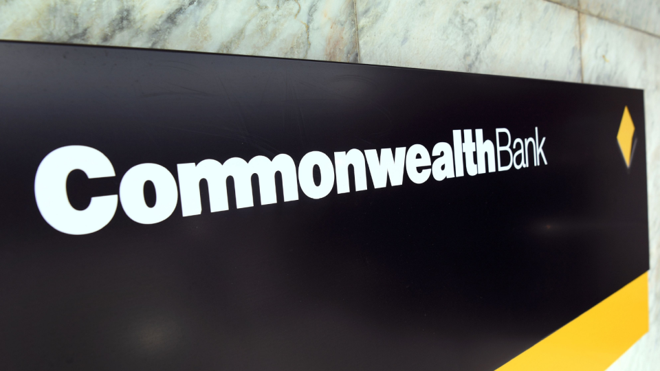 A Commonwealth Bank sign on the exterior of a building.