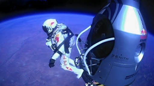 Austrian daredevil Felix Baumgartner jumps out of a capsule more than 24 miles above the Earth on October 14. He became the first man to break the sound barrier in a record-shattering, death-defying freefall jump from the edge of space. Image provided by www.redbullcontentpool.com