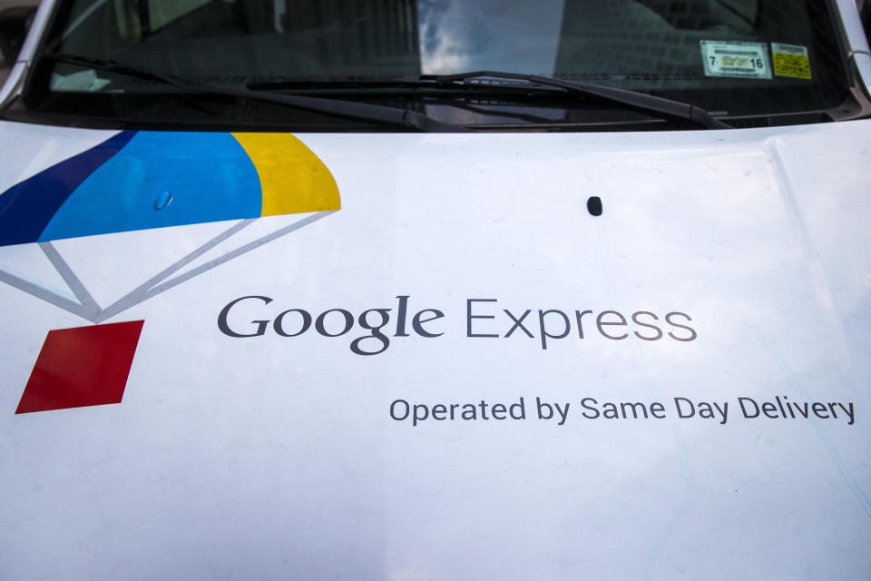 The Google Express logo is seen on one of its delivery trucks parked in New York August 17, 2015. This logo has been updated and is no longer in use. REUTERS/Brendan McDermid