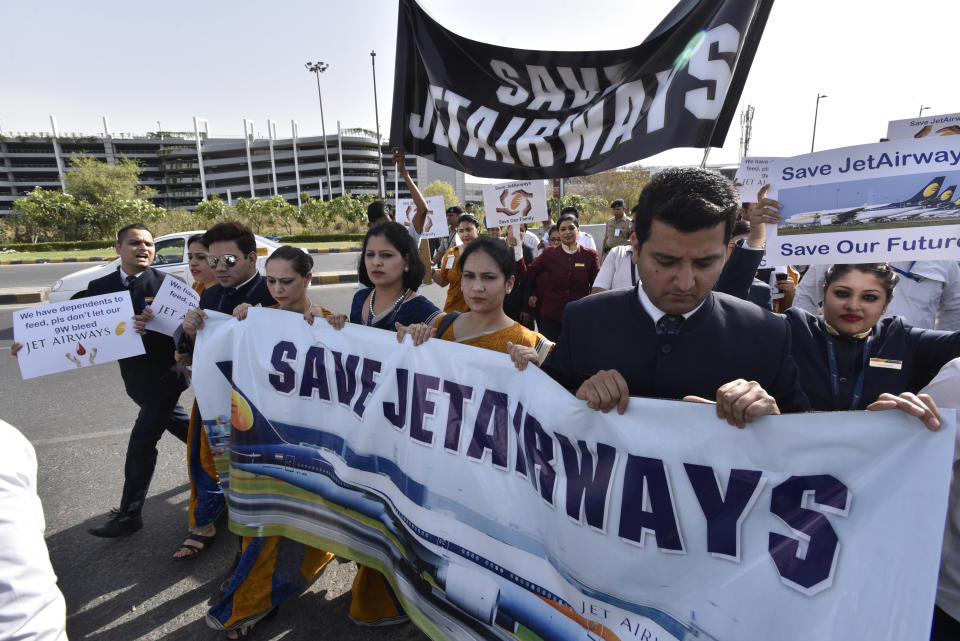Jet Airways employees protest delays in their salaries outside IGl Airport. Photo: Sanjeev Verma/Hindustan Times/SIPA USA/PA Images