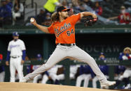 Baltimore Orioles starting pitcher Dean Kremer delivers to the plate against the Texas Rangers during the first inning of a baseball game in Arlington, Texas, Saturday, April 17, 2021. (AP Photo/Ray Carlin)